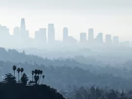 Heavy smog over the city. Exponent helps you accurately assess environmental impacts and business liabilities associated with contamination.